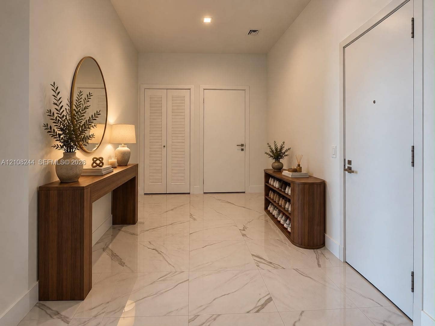 1170 Hallandale Beach Boulevard, #605, Hallandale Beach, Hallandale Beach, FL 33009 Large-format polished stone flooring with neutral veining, high ceilings with recessed lighting, and crisp white interior doors