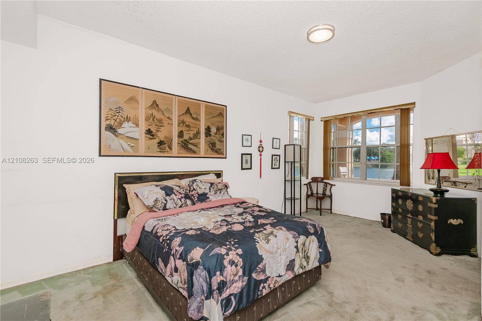 14817 Balgowan Road, #102-5, Miami Lakes, FL 33016 Room featuring multi-pane windows and a flush-mount ceiling light fixture