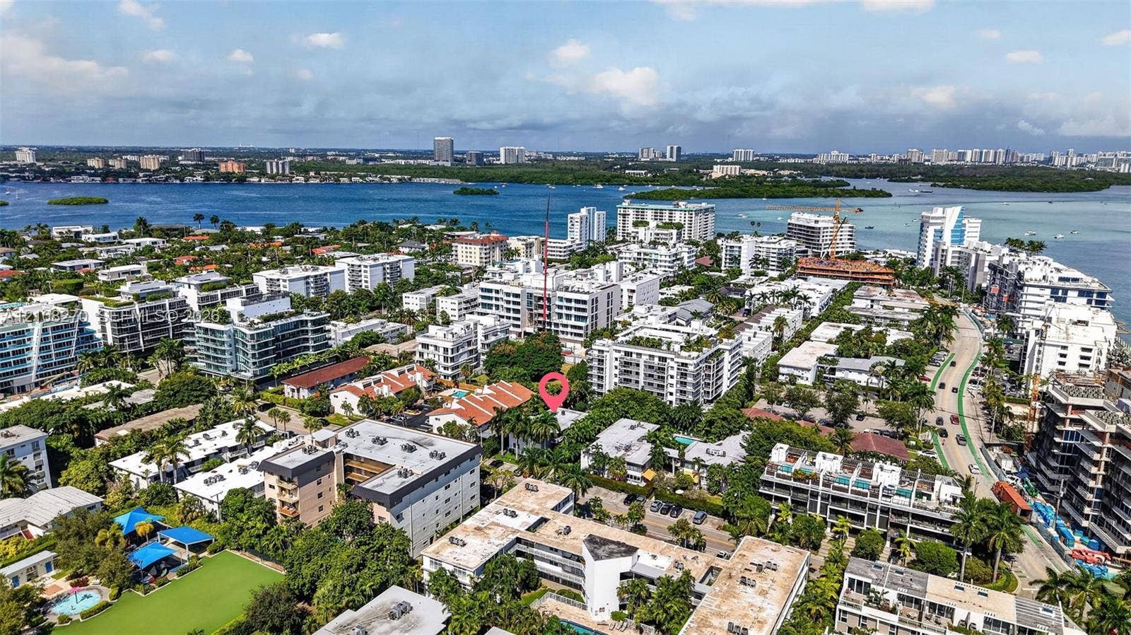 1125 99th Street, #12, Bay Harbor Islands, FL 33154 Aerial perspective of the property location, characterized by mature tropical landscaping, dense residential density, and proximity to coastal waters