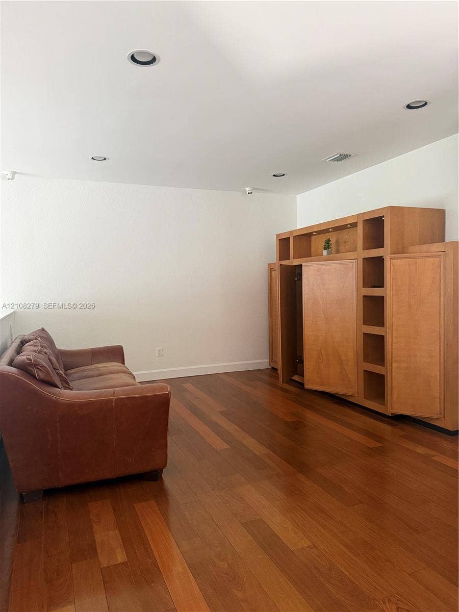 19424 39th Avenue, Sunny Isles Beach, Sunny Isles Beach, FL 33160 Custom built-in wood cabinetry, wood-finish flooring, and recessed ceiling lighting