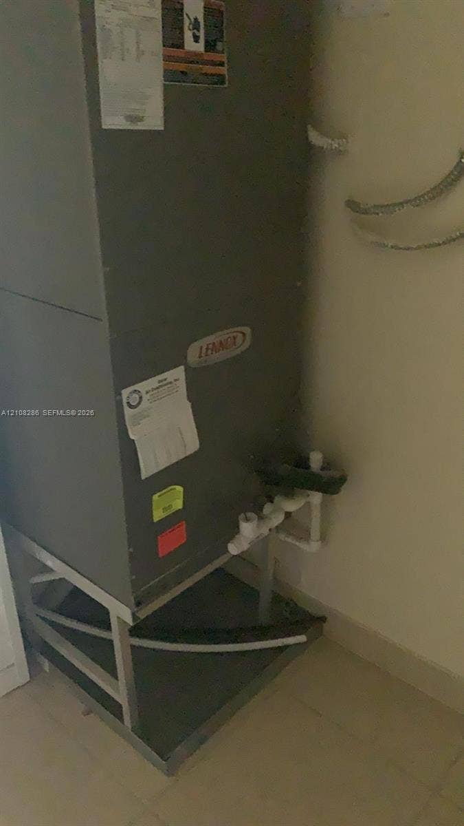 Lennox air handler unit mounted on a metal support stand
