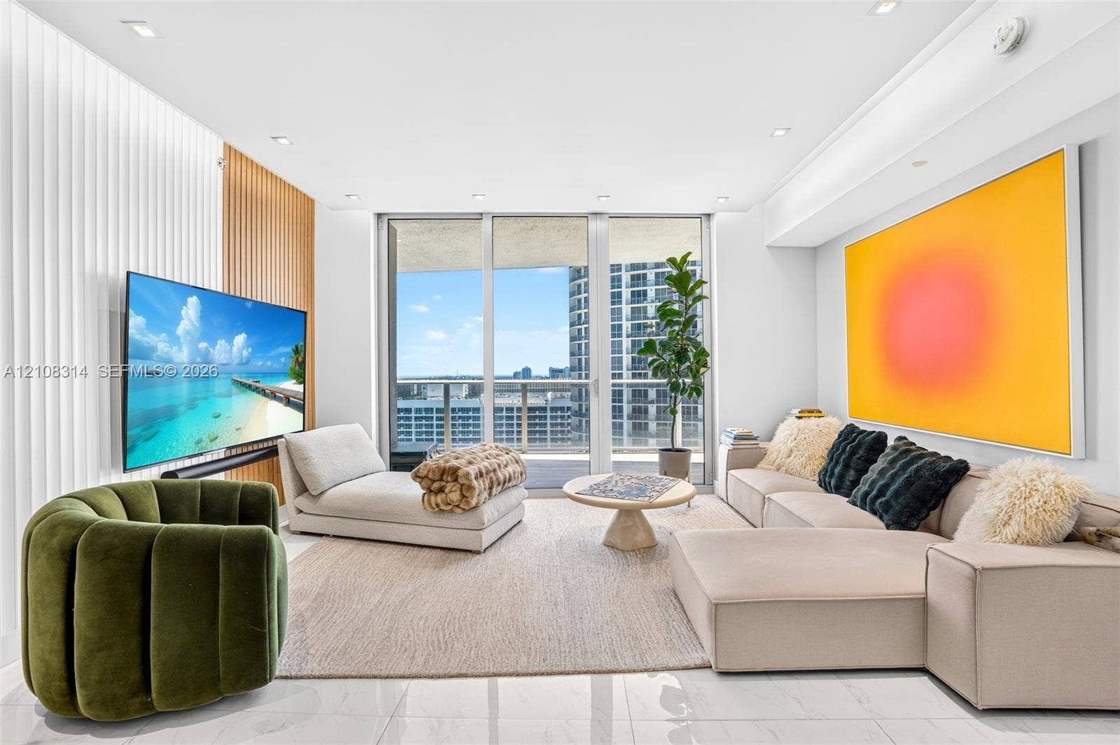 488 NE 18th Street, #4010, Miami, FL 33132 Living area featuring floor-to-ceiling glass windows, recessed lighting, white tile flooring, and a decorative wood-slat accent wall