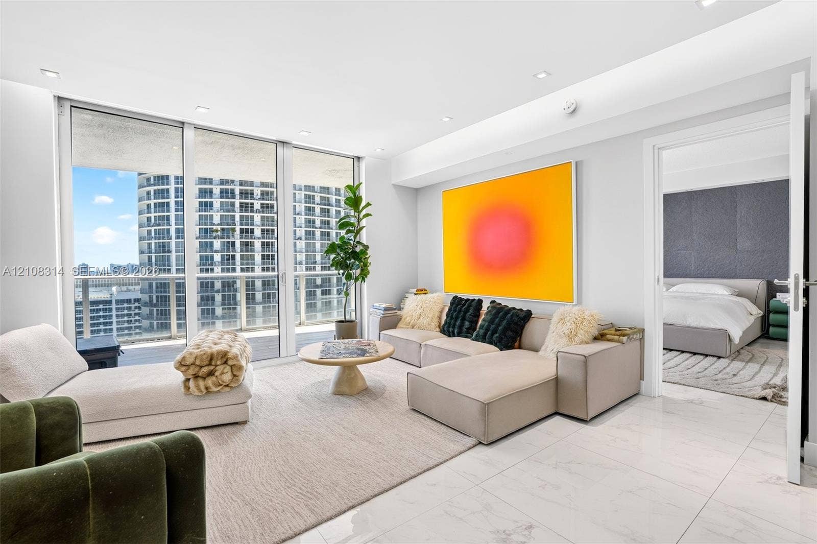 488 NE 18th Street, #4010, Miami, FL 33132 Floor-to-ceiling windows, polished stone-finish tile flooring, and recessed ceiling lighting