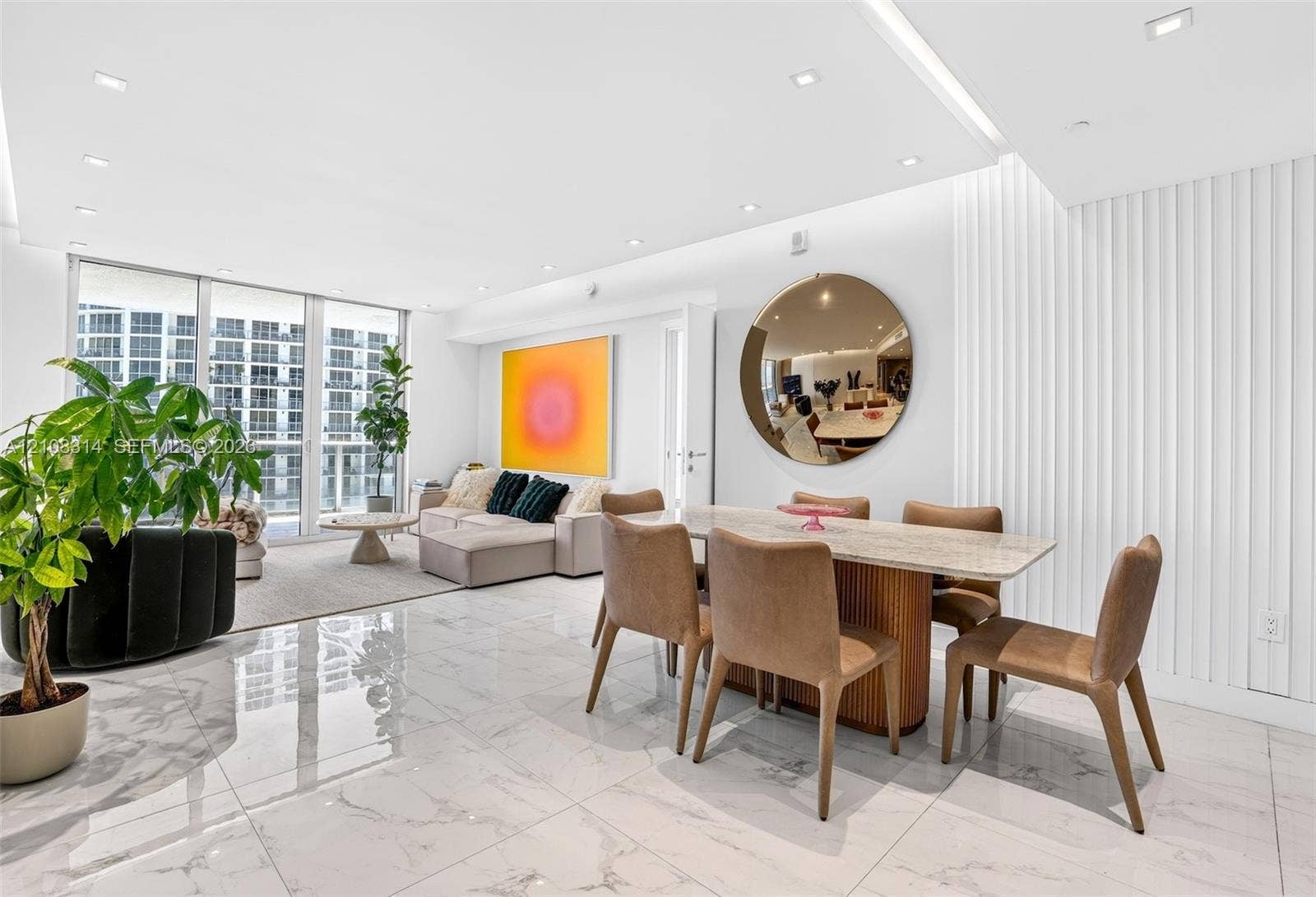 488 NE 18th Street, #4010, Miami, FL 33132 Large-format tile flooring, vertical wall paneling, recessed lighting, and floor-to-ceiling glass windows