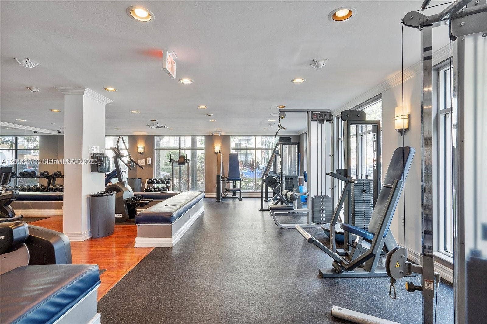 1900 Van Buren Street, #411B, Hollywood, FL 33020 Fitness facility featuring expansive floor-to-ceiling windows, recessed lighting, and a combination of wood-finish and resilient rubber flooring