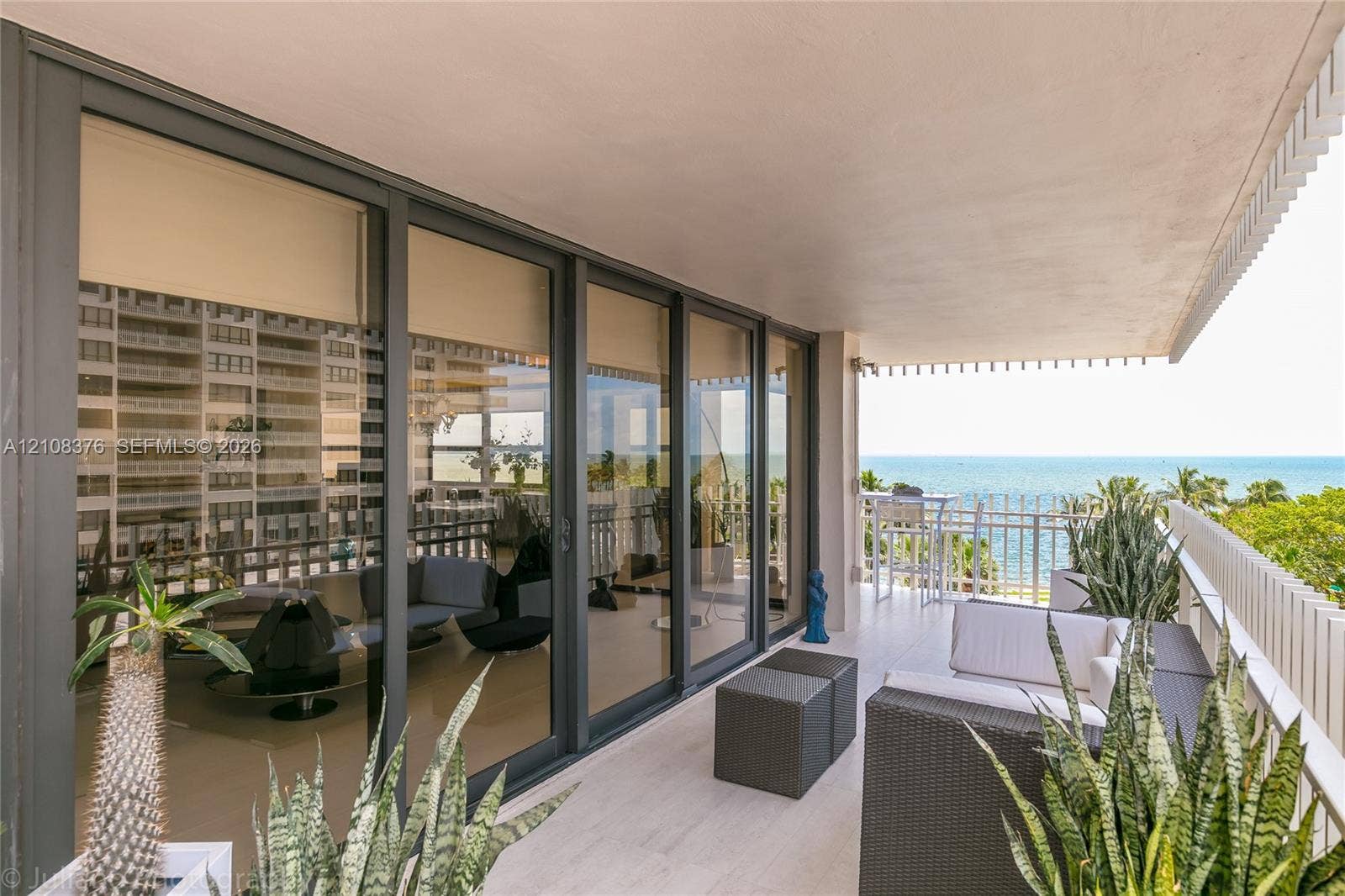 3 Grove Isle Drive, #C502, Miami, Miami, FL 33133 Main balcony offers magnificent Ocean and Bay view
