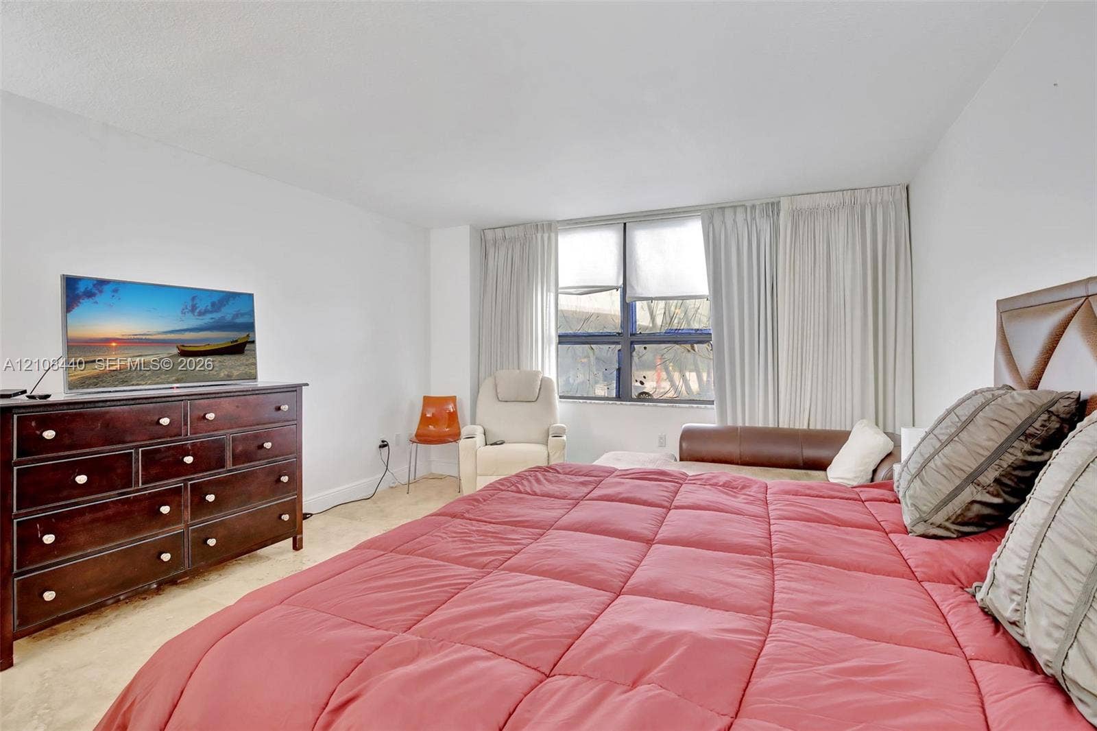9801 Collins Avenue, #3T, Bal Harbour, Bal Harbour, FL 33154 Spacious room featuring large windows, neutral wall finishes, and polished hard-surface flooring