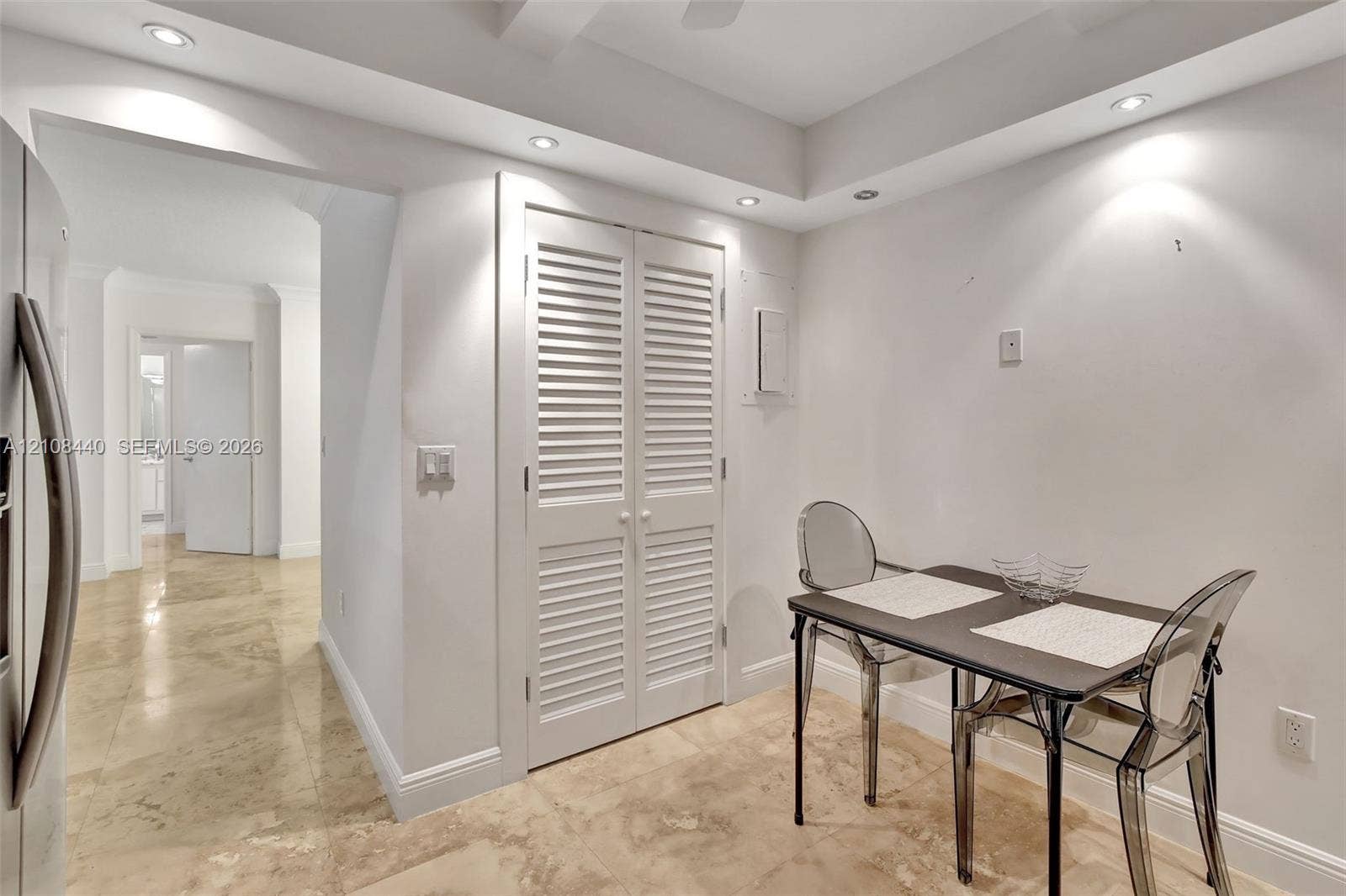 9801 Collins Avenue, #3T, Bal Harbour, Bal Harbour, FL 33154 Interior space featuring recessed lighting, polished stone flooring, and double louvered-panel doors