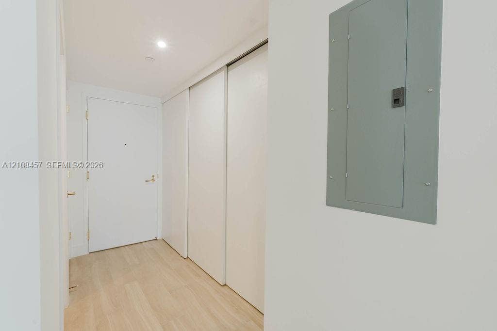 90 NE 32nd Street, #511, Miami, FL 33127 Wood-finish flooring, full-height sliding-door closet, and solid core entry door