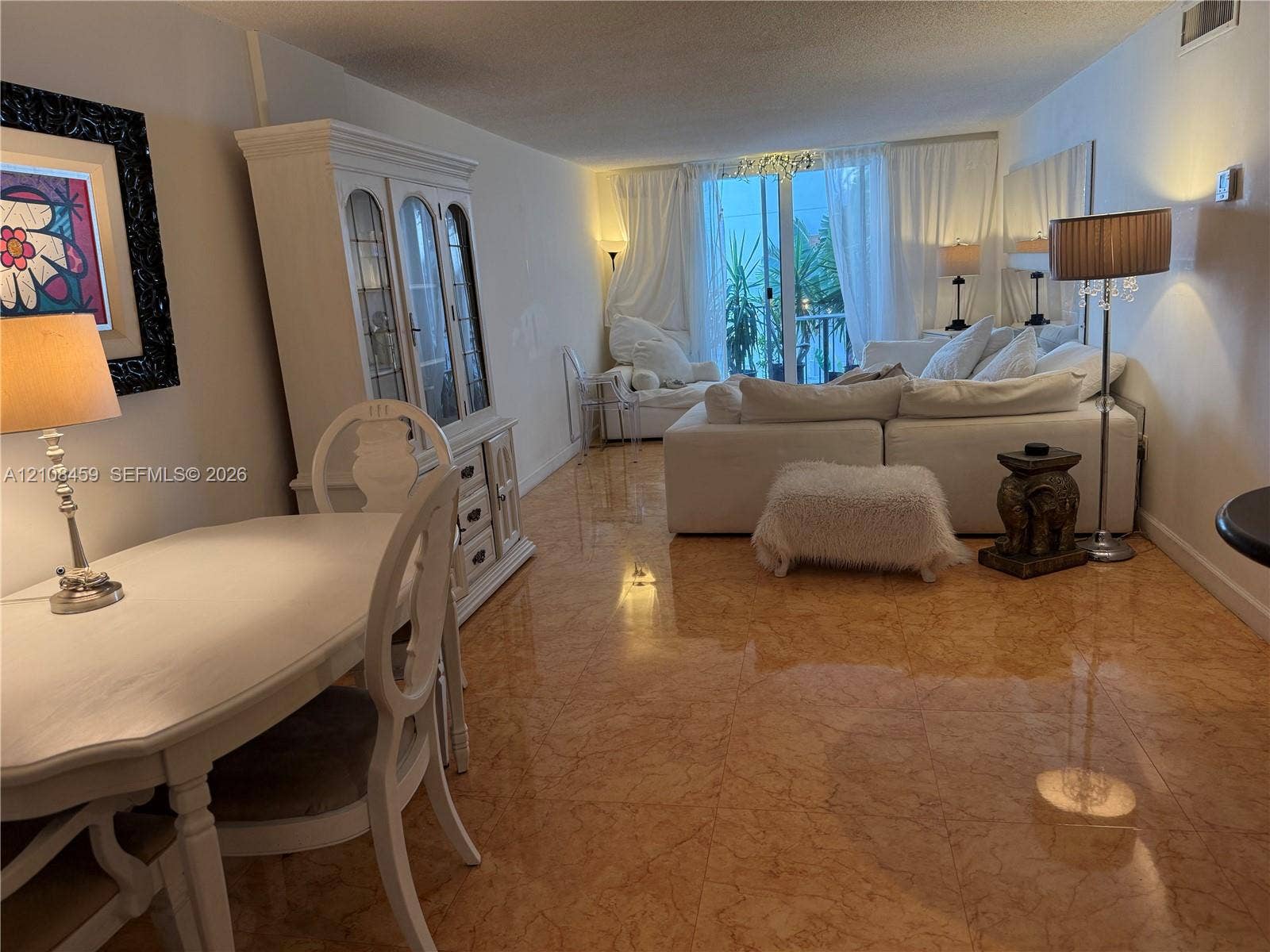 720 Collins Avenue, #206, Miami Beach, Miami Beach, FL 33139 Polished stone flooring, sliding glass door with exterior balcony access, and recessed ceiling lighting