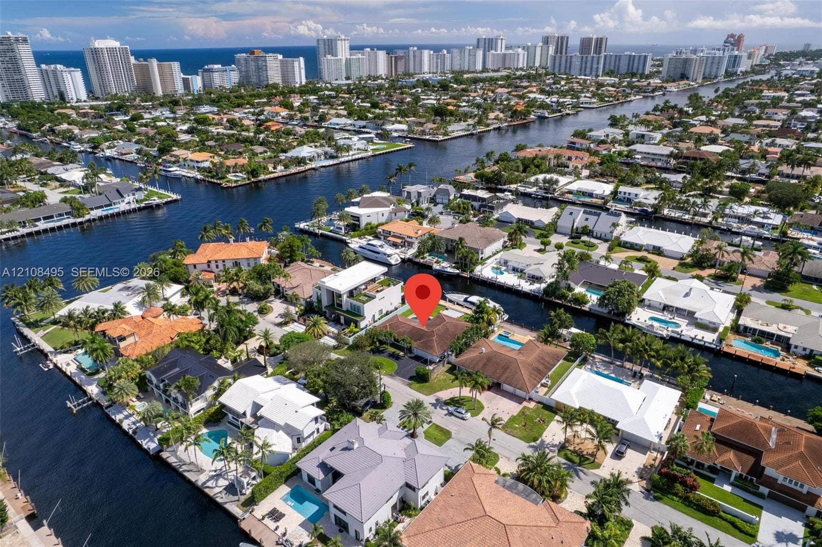 3080 NE 43rd Street, Fort Lauderdale, FL 33308 Waterfront property with direct canal access situated in a coastal residential setting