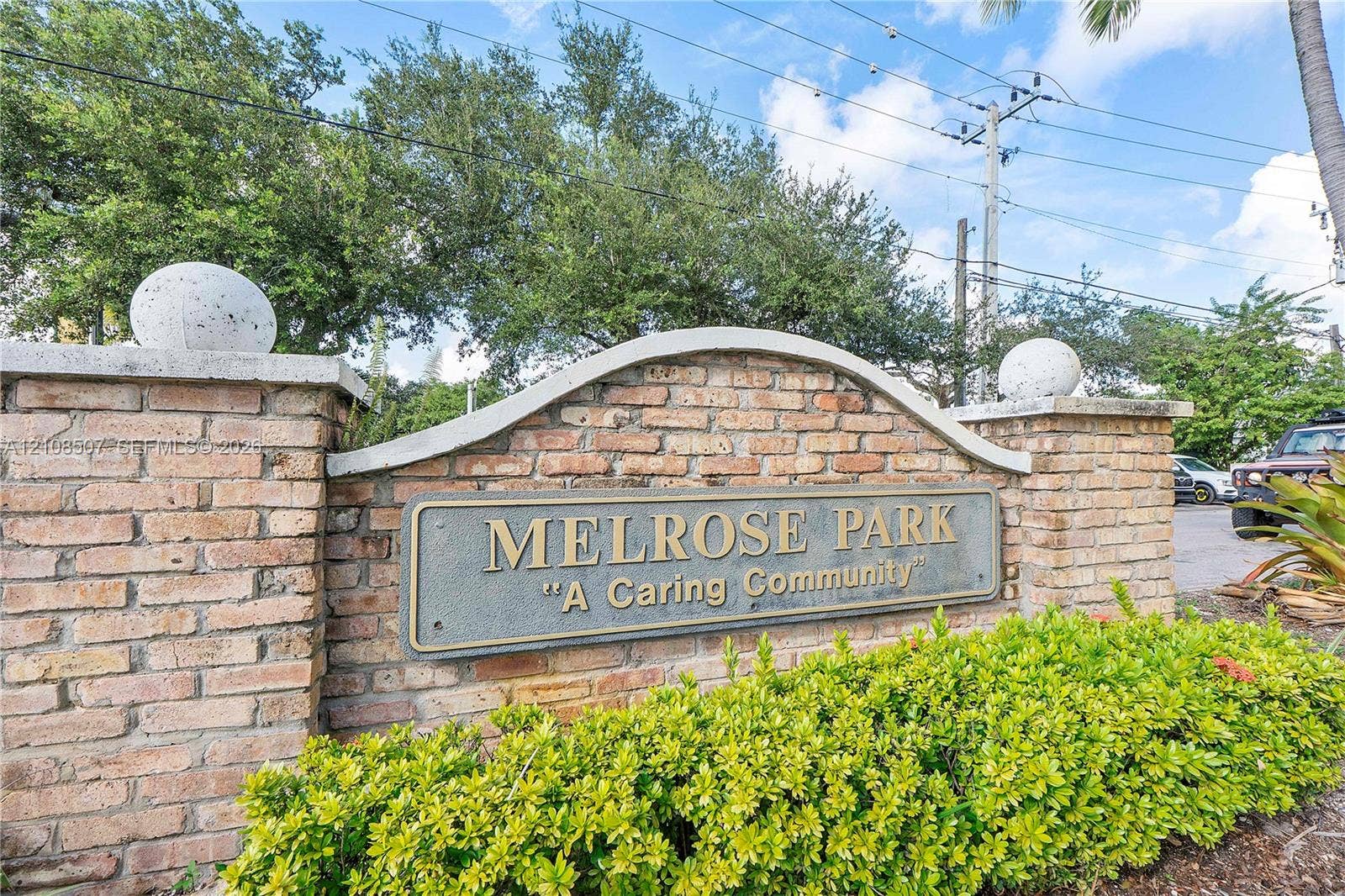 451 SW 38th Terrace, #1, Fort Lauderdale, Fort Lauderdale, FL 33312 Brick entrance monument featuring a custom arch cap, spherical finials, and mature landscaping
