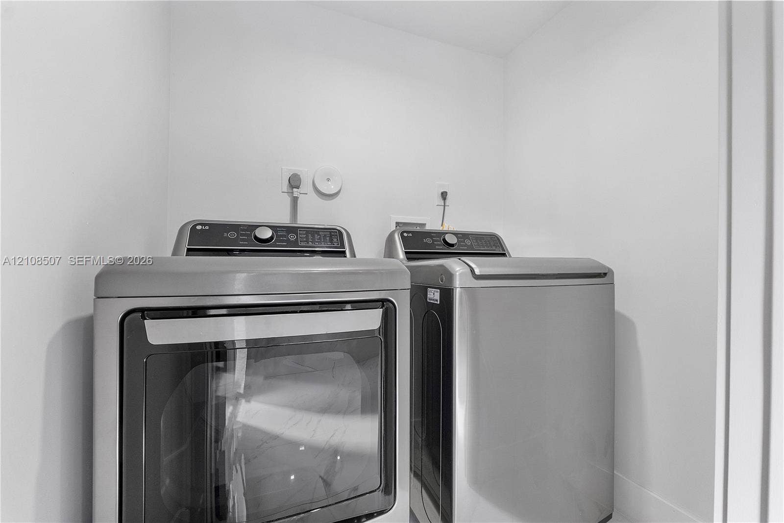 451 SW 38th Terrace, #1, Fort Lauderdale, Fort Lauderdale, FL 33312 Dedicated laundry alcove equipped with stainless steel front-loading washer and dryer units