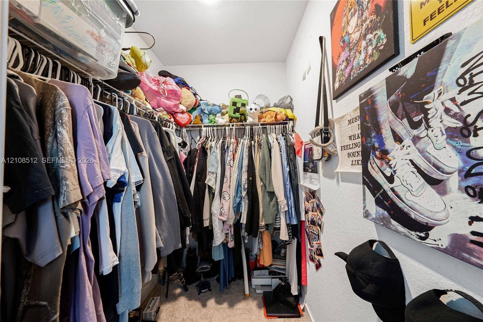 Reach-in closet featuring wire shelving