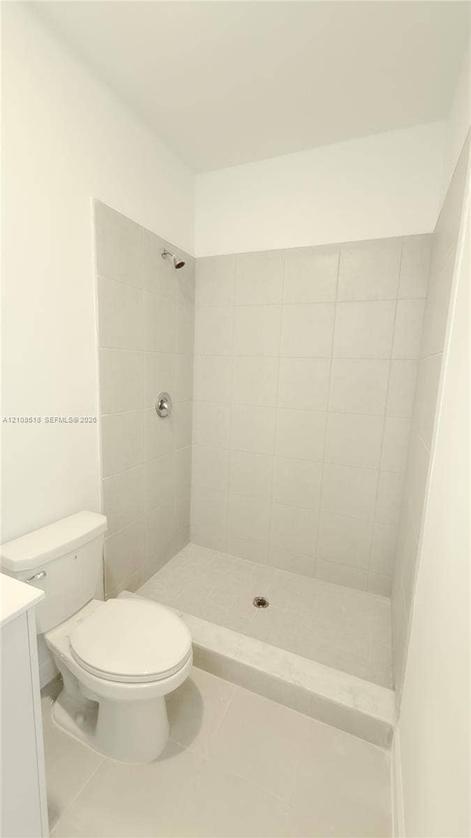 27733 SW 155th Court, #27733, Homestead, Homestead, FL 33032 Walk-in shower with light-toned wall tile, porcelain shower basin, and chrome shower head