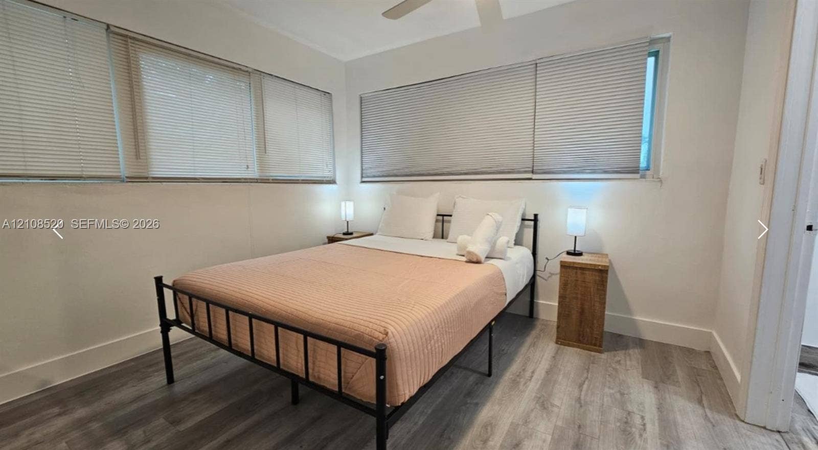 4536 SW 24th Avenue, Dania, Dania Beach, FL 33312 Neutral interior featuring wood-finish flooring, horizontal blinds, and a ceiling fan