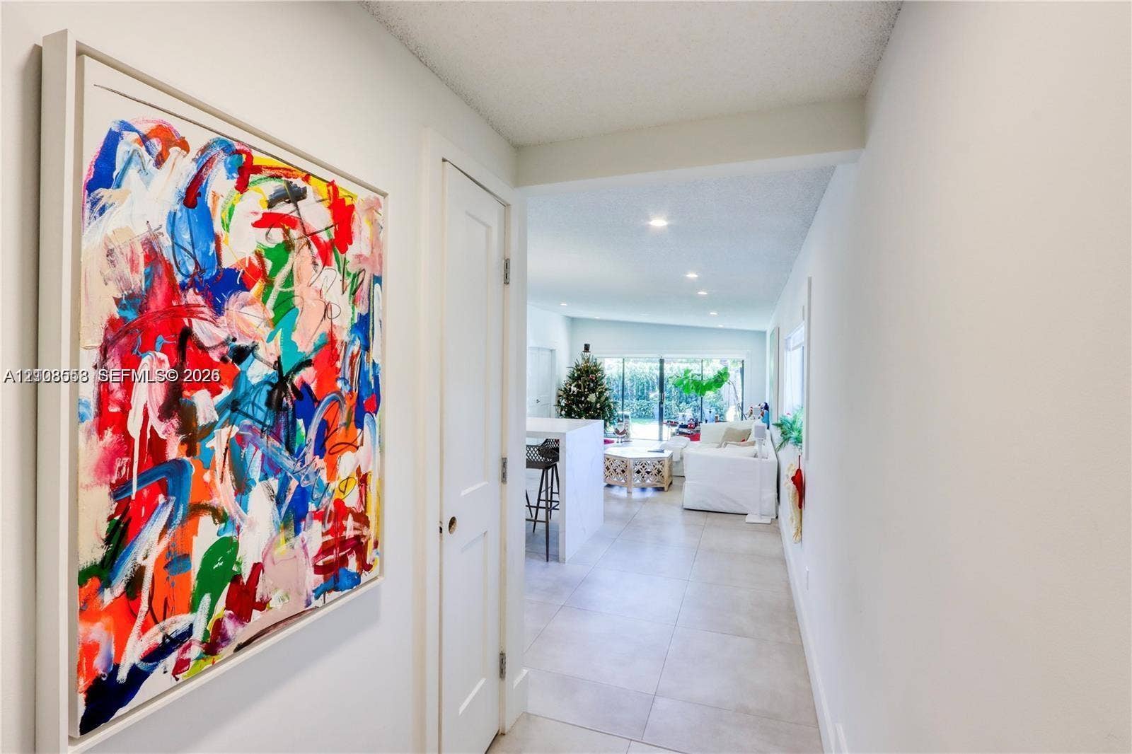 10478 SW 75th Lane, #10478, Miami, Miami, FL 33173 Neutral wall palette with large-format tile flooring, recessed ceiling lighting, and solid-core interior doors