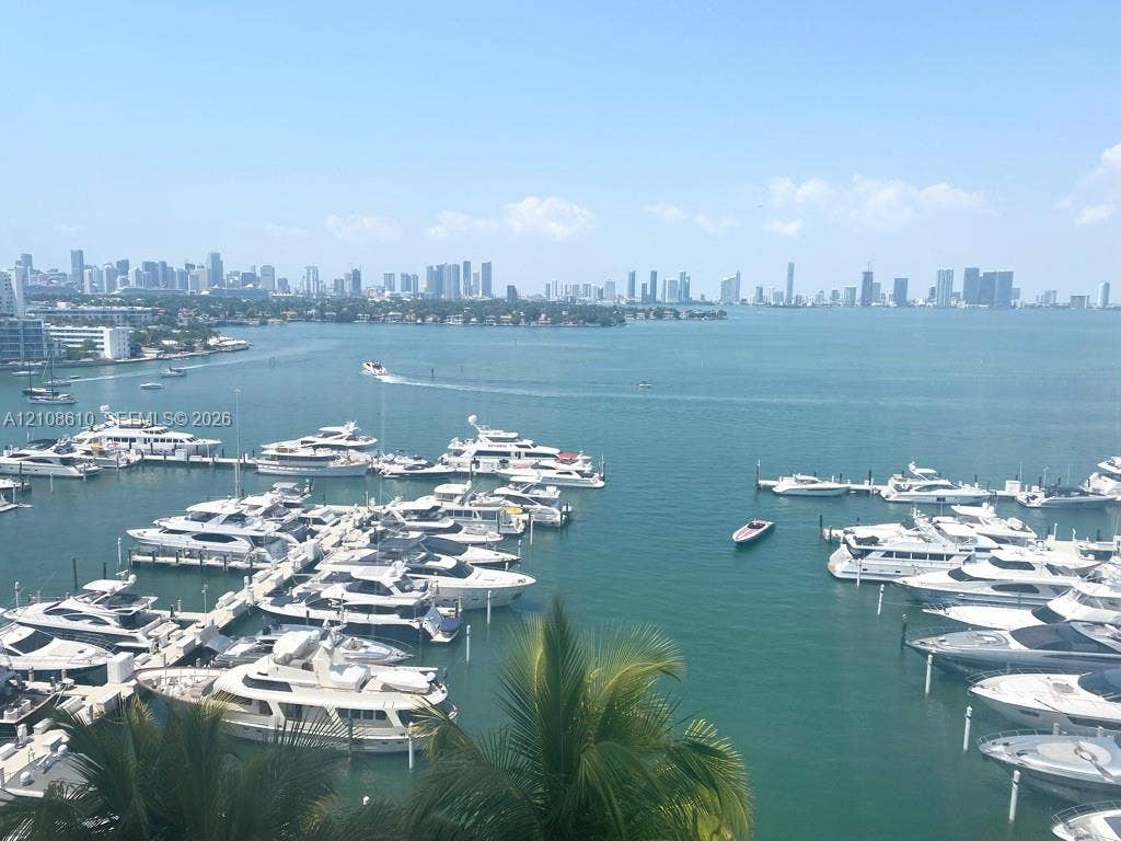 1900 Sunset Harbour Drive, #1210, Miami Beach, Miami Beach, FL 33139 Panoramic waterfront perspective featuring a marina with multiple boat slips, deep-water access, and a prominent urban skyline backdrop