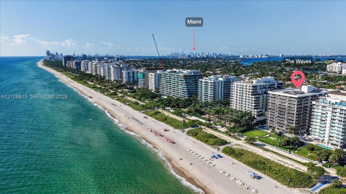9455 Collins Avenue, #1201, Surfside, FL 33154 Aerial perspective featuring direct oceanfront positioning, expansive sandy coastline, and proximity to the urban skyline