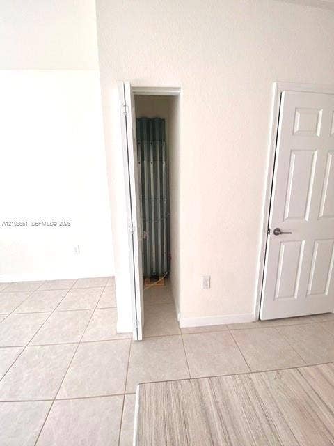 3288 W 106th Terrace, #3288, Hialeah, Hialeah, FL 33018 Neutral ceramic floor tiling, six-panel interior door, and built-in closet storage space