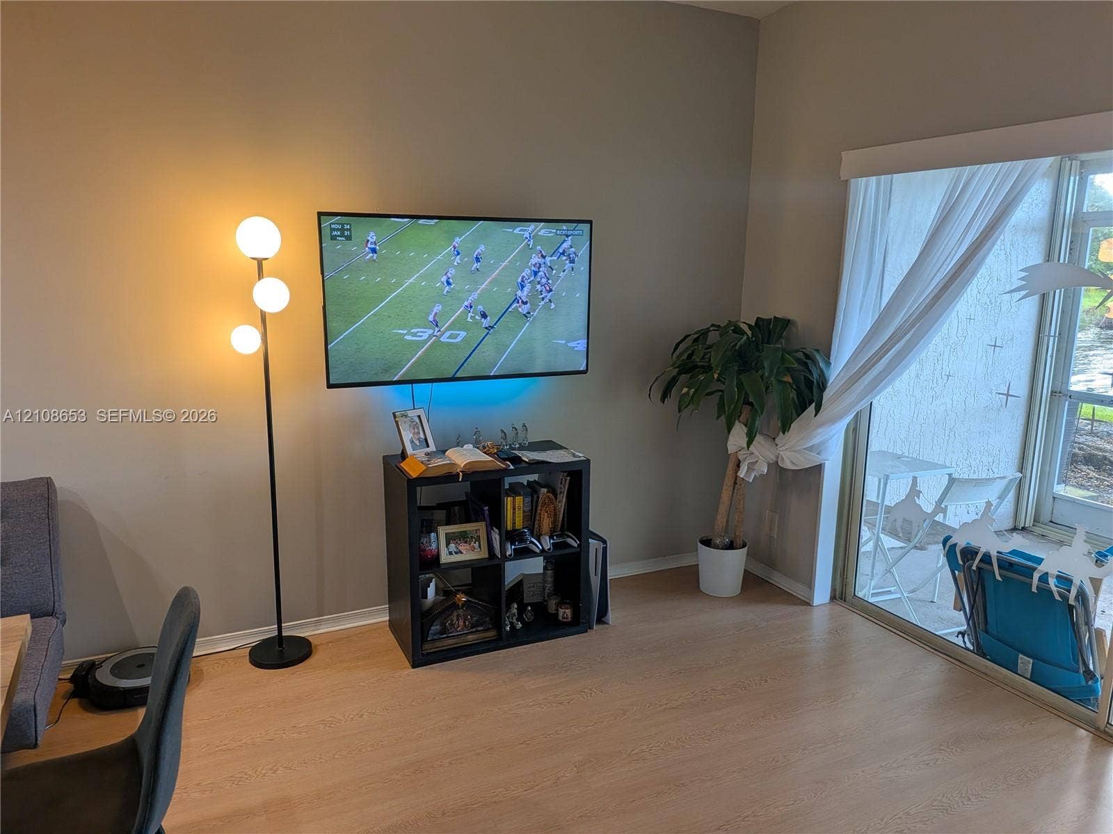 291 Duval Court, #0, Weston, Weston, FL 33326 Wood-finish flooring and sliding glass door leading to an outdoor space
