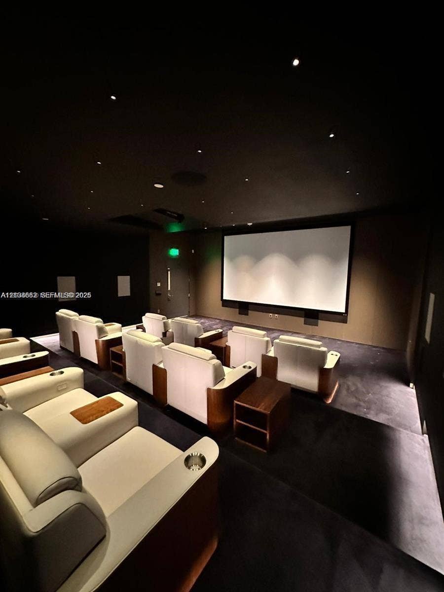 300 Biscayne Boulevard, #2709W, Miami, Miami, FL 33131 Dedicated media room featuring tiered flooring, large projection screen, and recessed fiber optic ceiling lighting