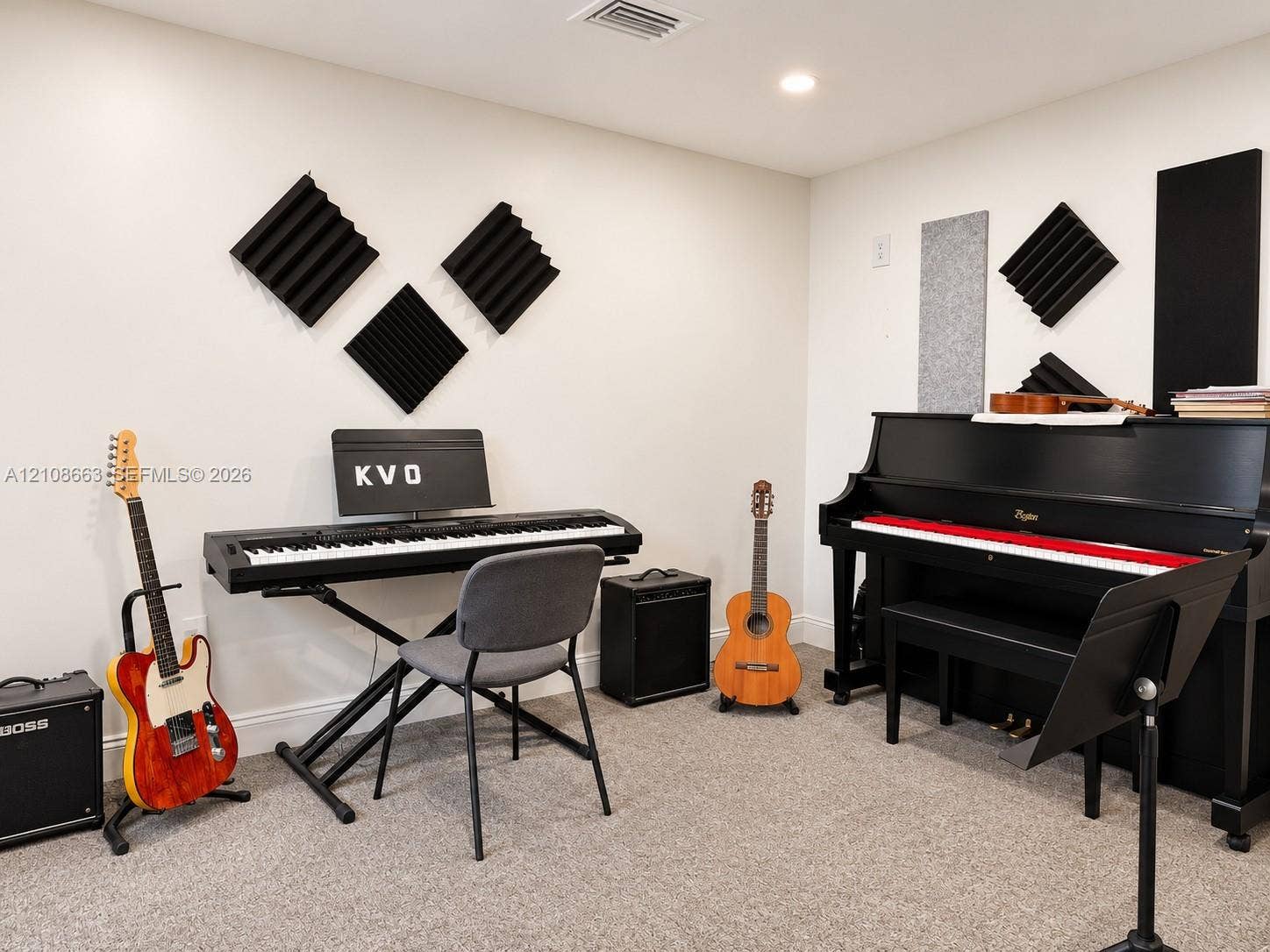 Doral, Doral, FL 33166 Dedicated room featuring wall-mounted sound-attenuation panels, neutral wall finish, and carpeted flooring