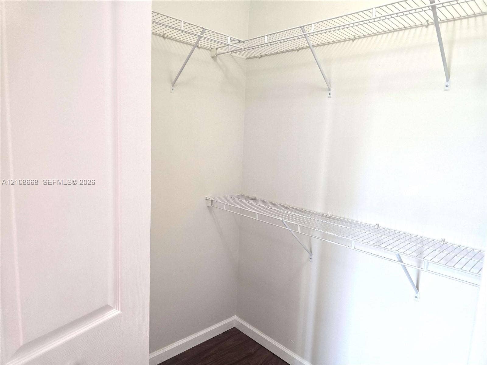 4508 SW 160th Avenue, #734, Miramar, Miramar, FL 33027 Walk-in storage space featuring wood-finish flooring and tiered white wire shelving