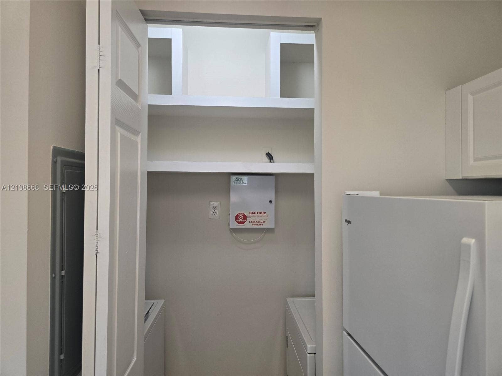 4508 SW 160th Avenue, #734, Miramar, Miramar, FL 33027 Built-in shelving units and interior closet space featuring solid-core door and neutral finish