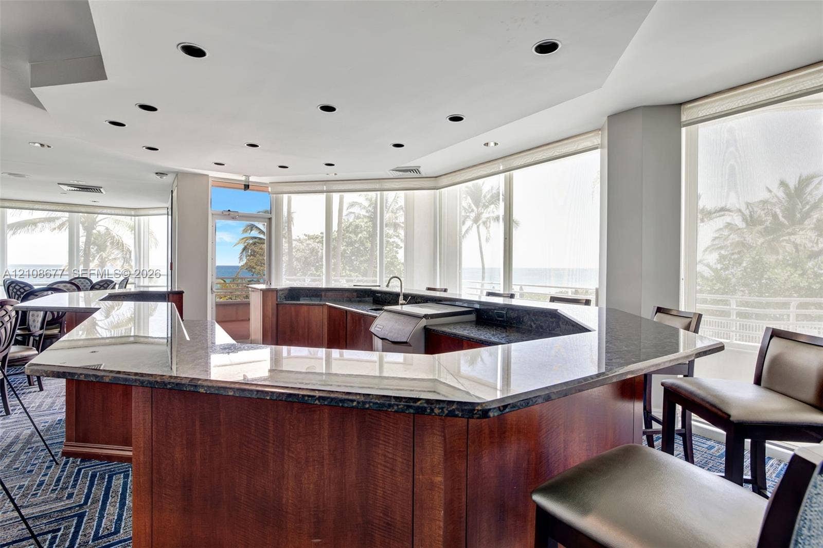 1440 S Ocean Boulevard, #11A, Lauderdale By The Sea, FL 33062 Wrap-around bar area in community room w/ floor-to-ceiling windows