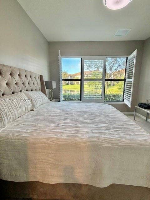 Triple-pane window configuration featuring white plantation shutters and natural lighting