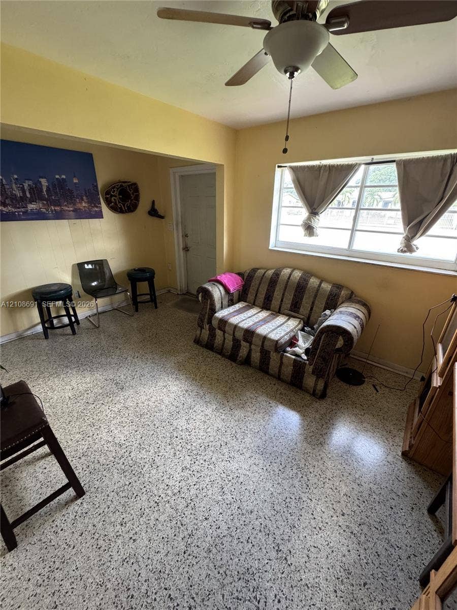 17210 NW 47th Avenue, Miami Gardens, FL 33055 Terrazzo flooring, multi-pane window, and ceiling fan with integrated lighting