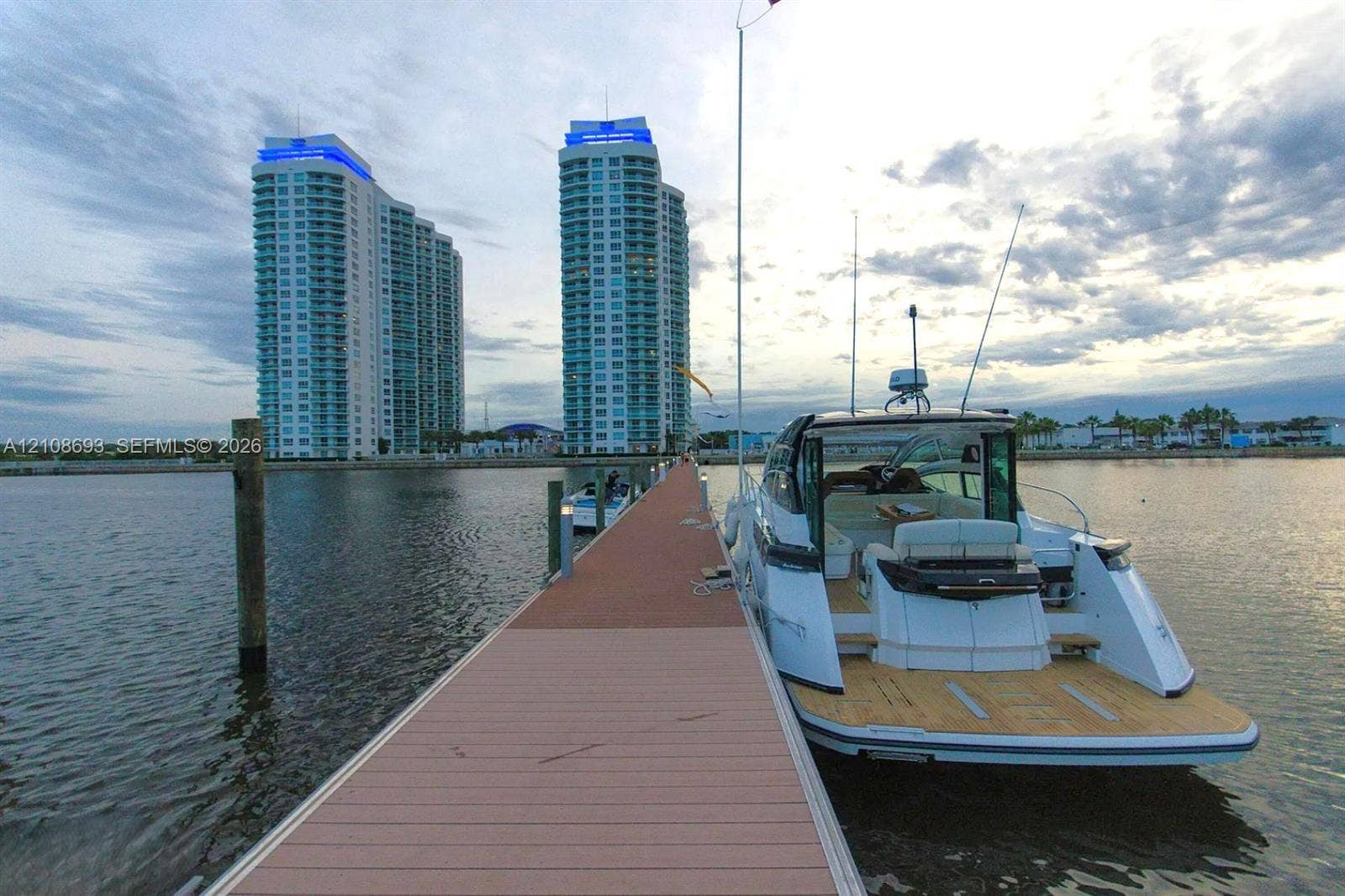 231 Riverside Drive, #1210, Daytona Beach, Daytona Beach, FL 32117 Fixed boat slip featuring composite decking, integrated dock lighting, and mooring pilings