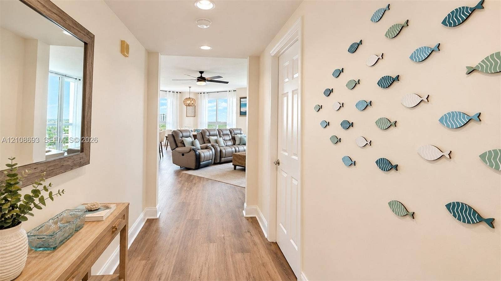 231 Riverside Drive, #1210, Daytona Beach, Daytona Beach, FL 32117 Entryway featuring wood-finish flooring, recessed lighting, and a six-panel interior door