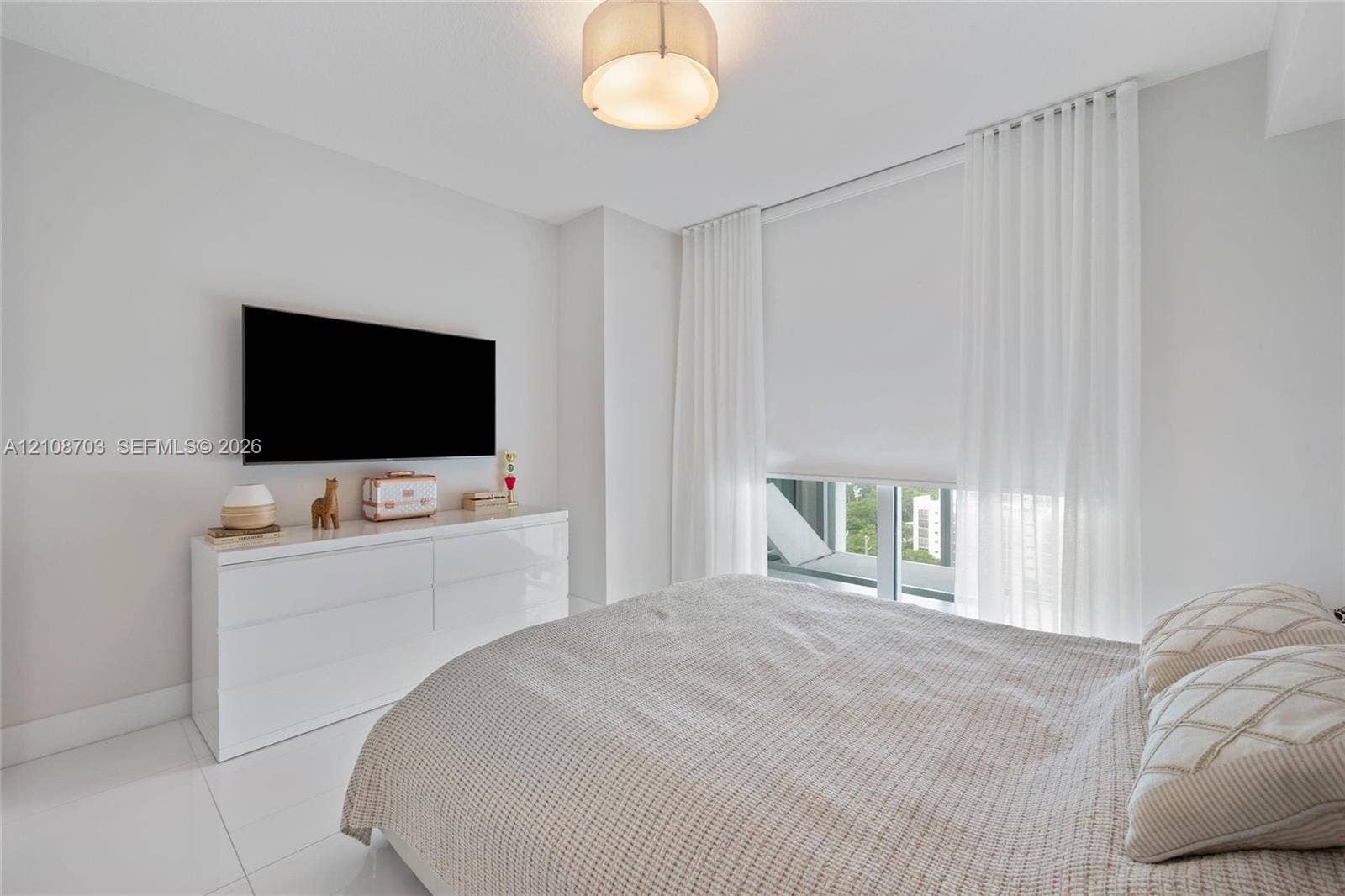 300 Sunny Isles Boulevard, #4-1501, Sunny Isles Beach, Sunny Isles Beach, FL 33160 Neutral interior featuring floor-to-ceiling windows, polished tile flooring, and a flush-mount drum ceiling light