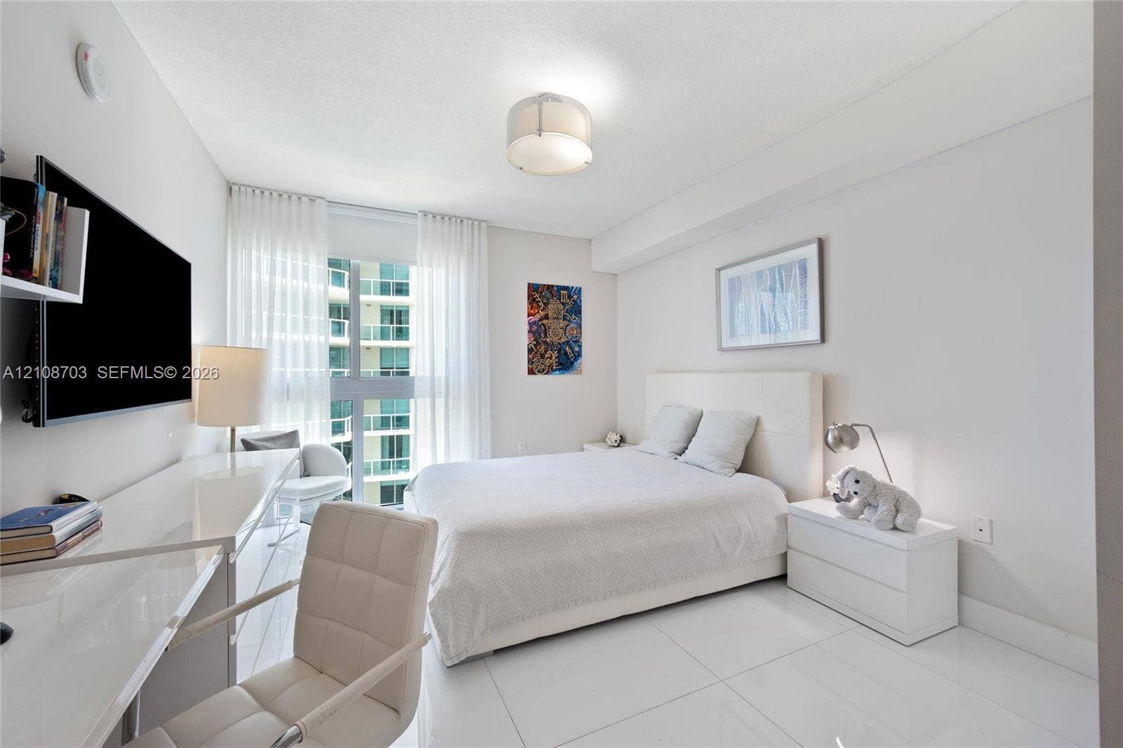 300 Sunny Isles Boulevard, #4-1501, Sunny Isles Beach, Sunny Isles Beach, FL 33160 Large-format tile flooring, ceiling-mounted drum light fixture, and floor-to-ceiling glass panel windows