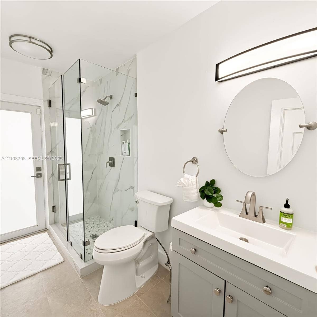 Bathroom with glass walk in shower