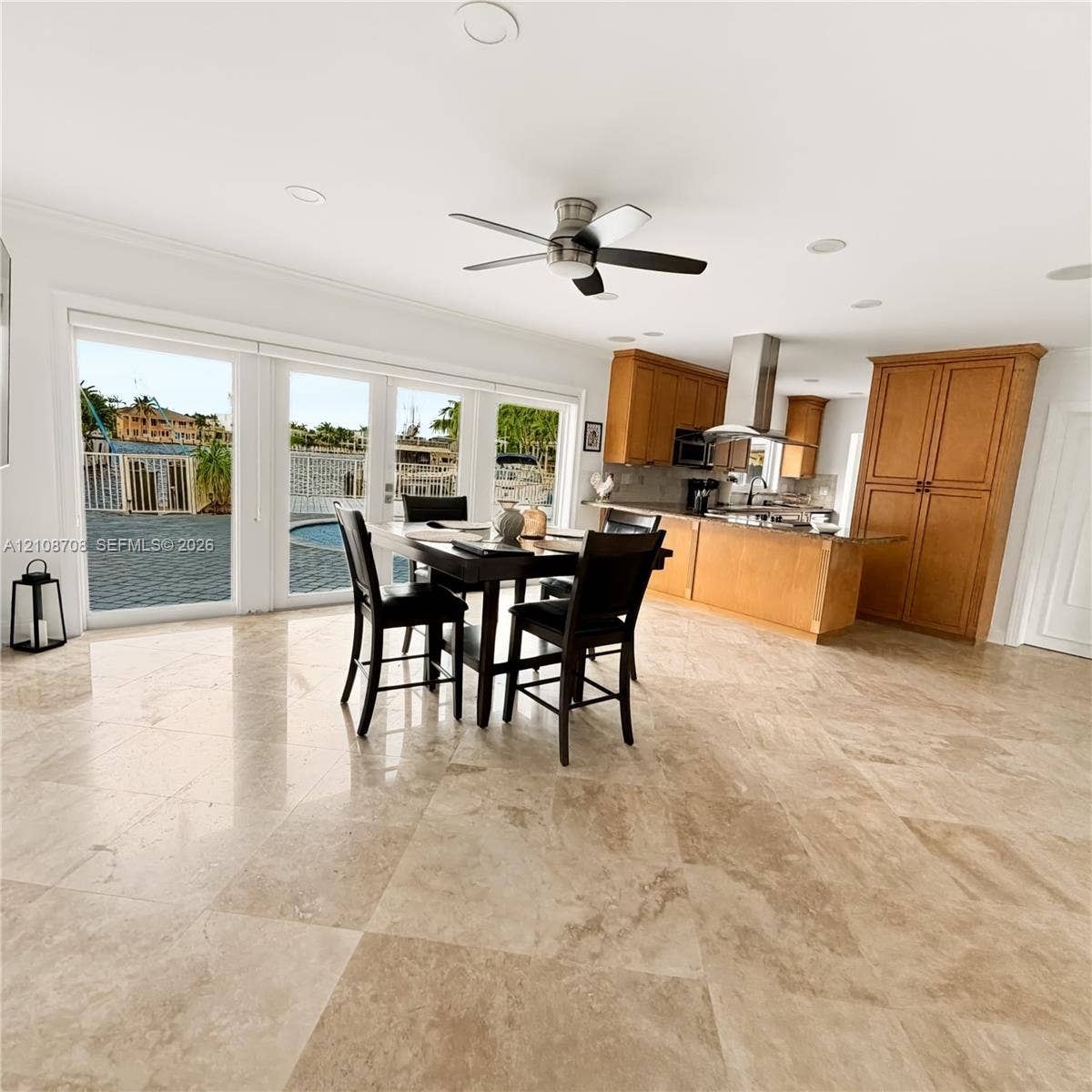 Open kitchen and dining area with water views