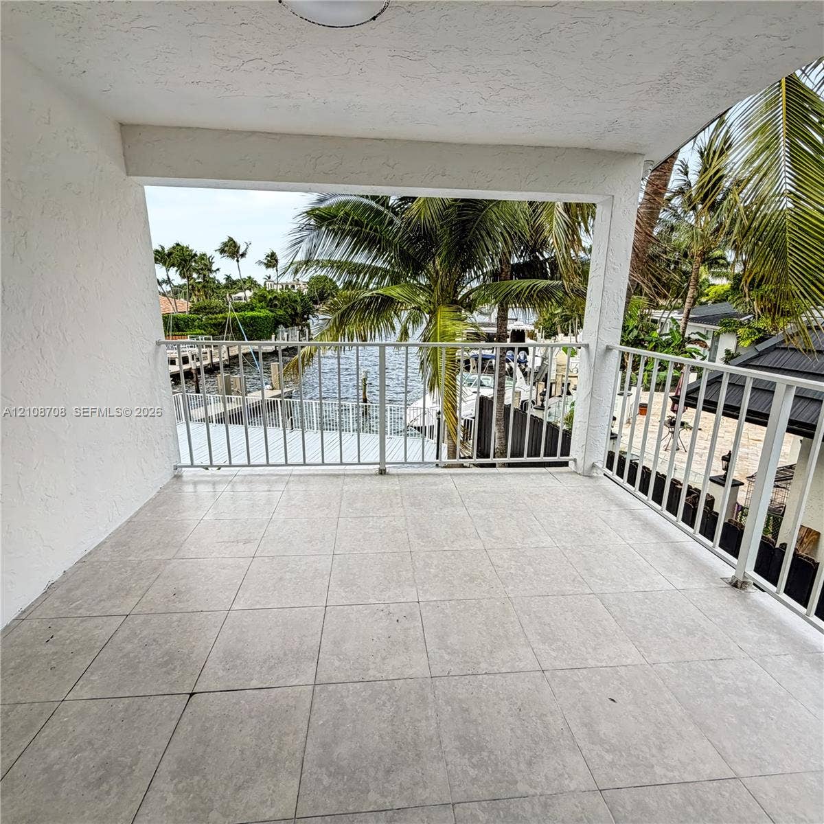 Covered balcony overlooking the water
