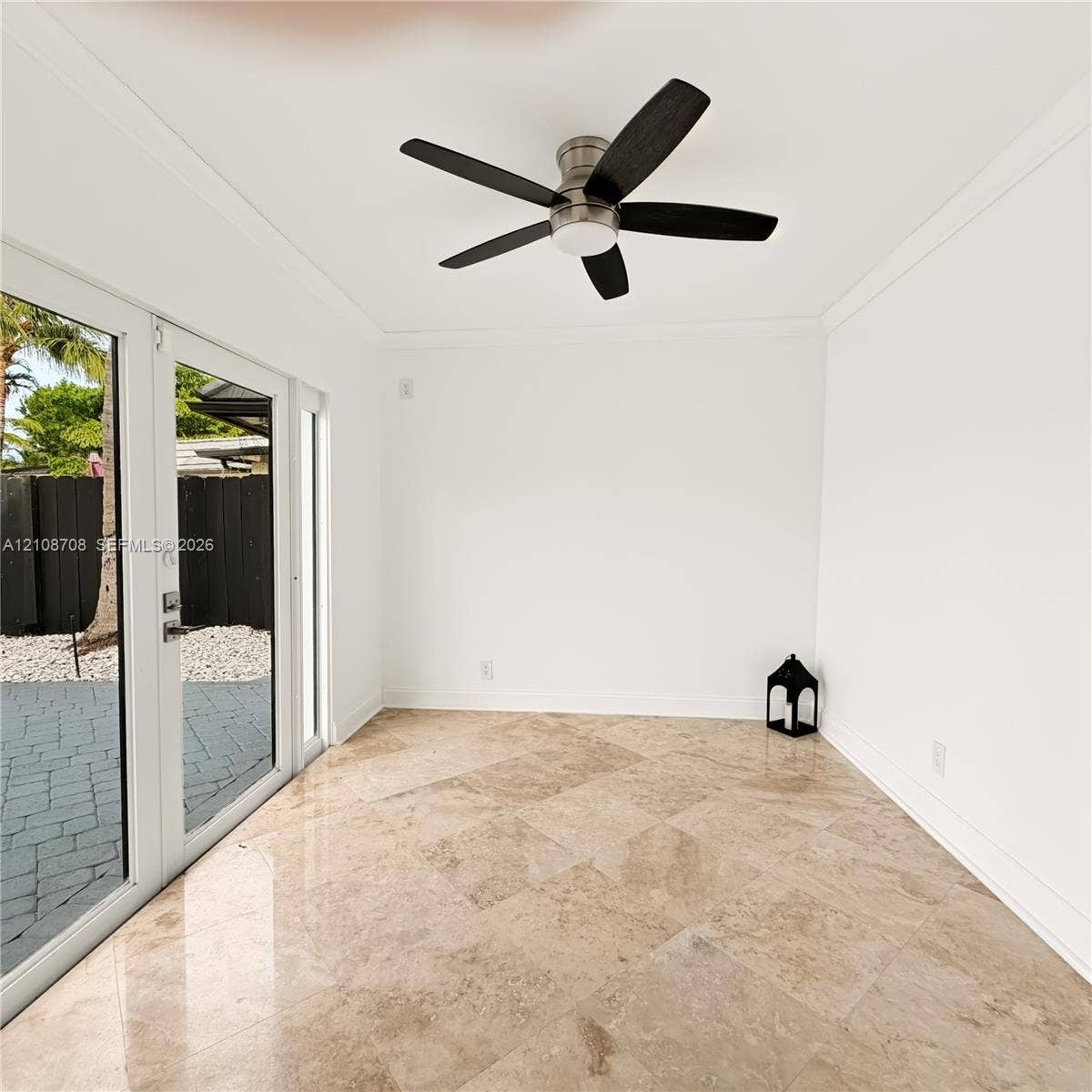 Bonus room with glass doors to the patio