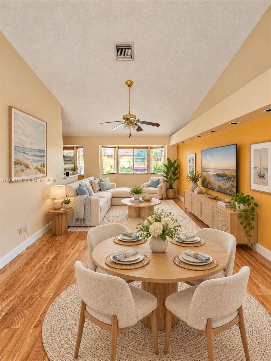 972 NW 92nd Terrace, Plantation, Plantation, FL 33324 Vaulted ceilings, wood-finish flooring, recessed lighting, and a bay window