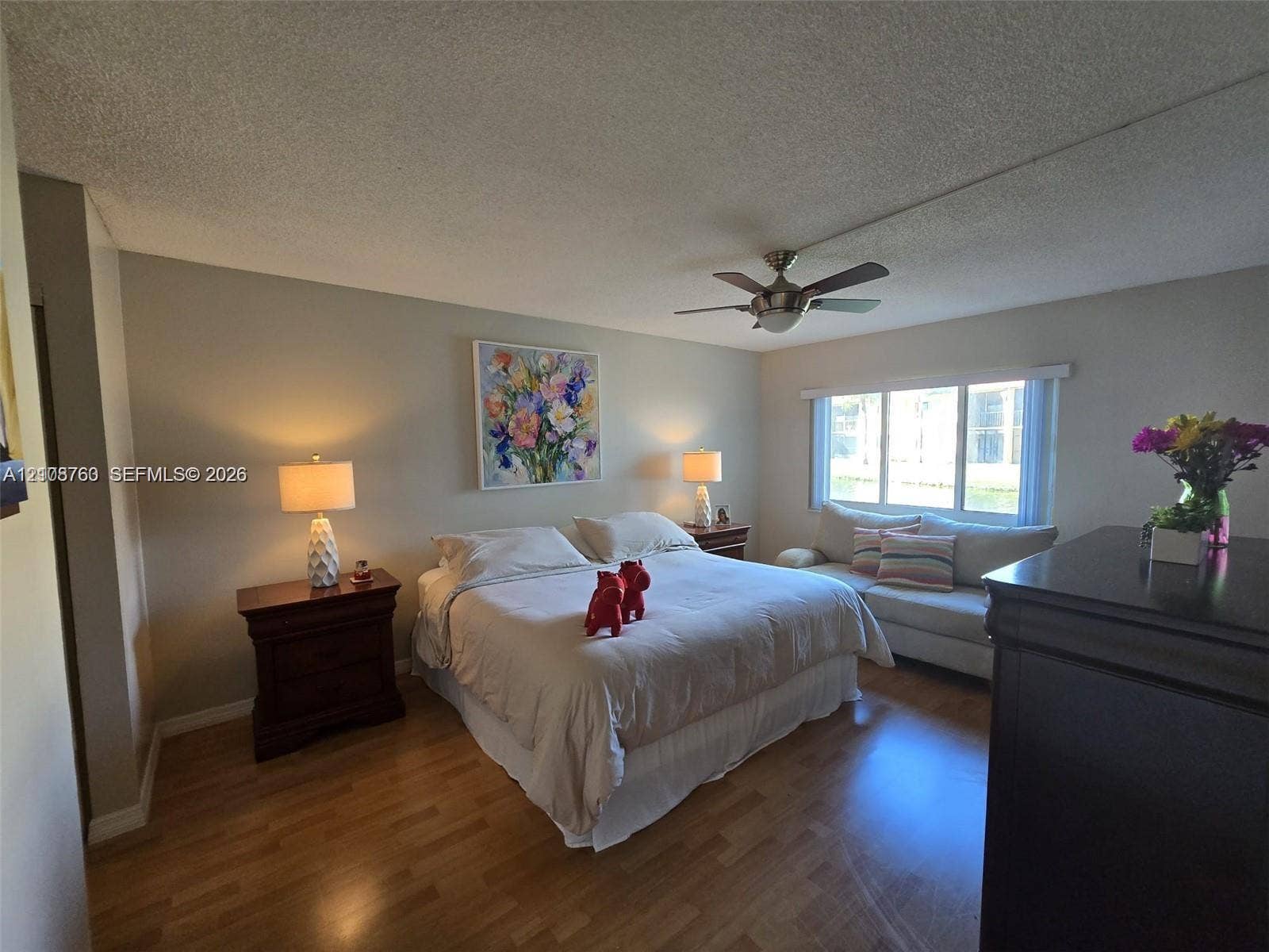140 Lakeview Drive, #111, Weston, Weston, FL 33326 Wood-finish flooring, multi-pane window, and integrated ceiling fan