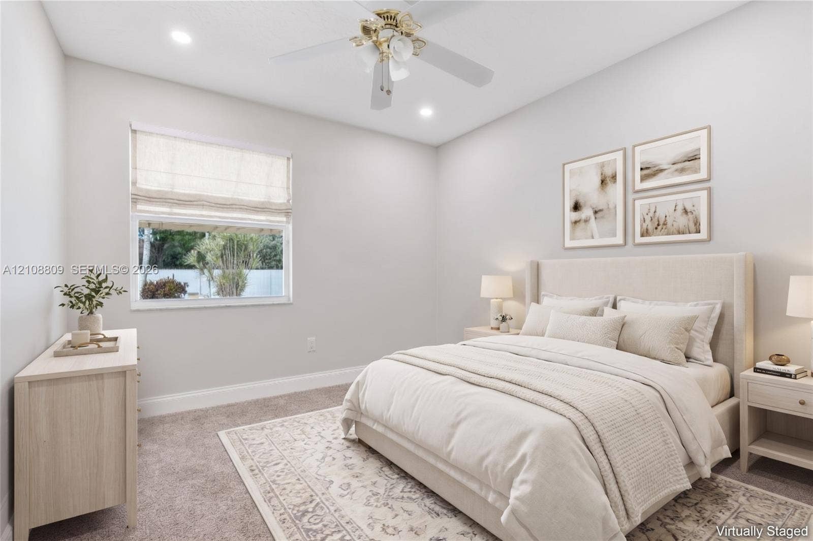 Neutral-toned room featuring plush wall-to-wall carpeting, recessed ceiling lighting, and a multi-blade ceiling fan with a central light fixture