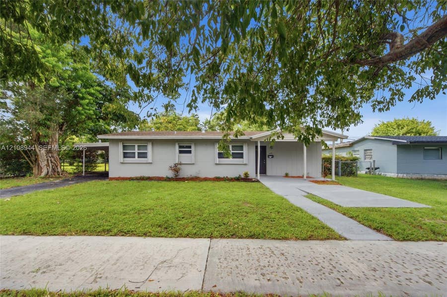 Property photo for 1450 NW 175th Street, Miami Gardens, FL