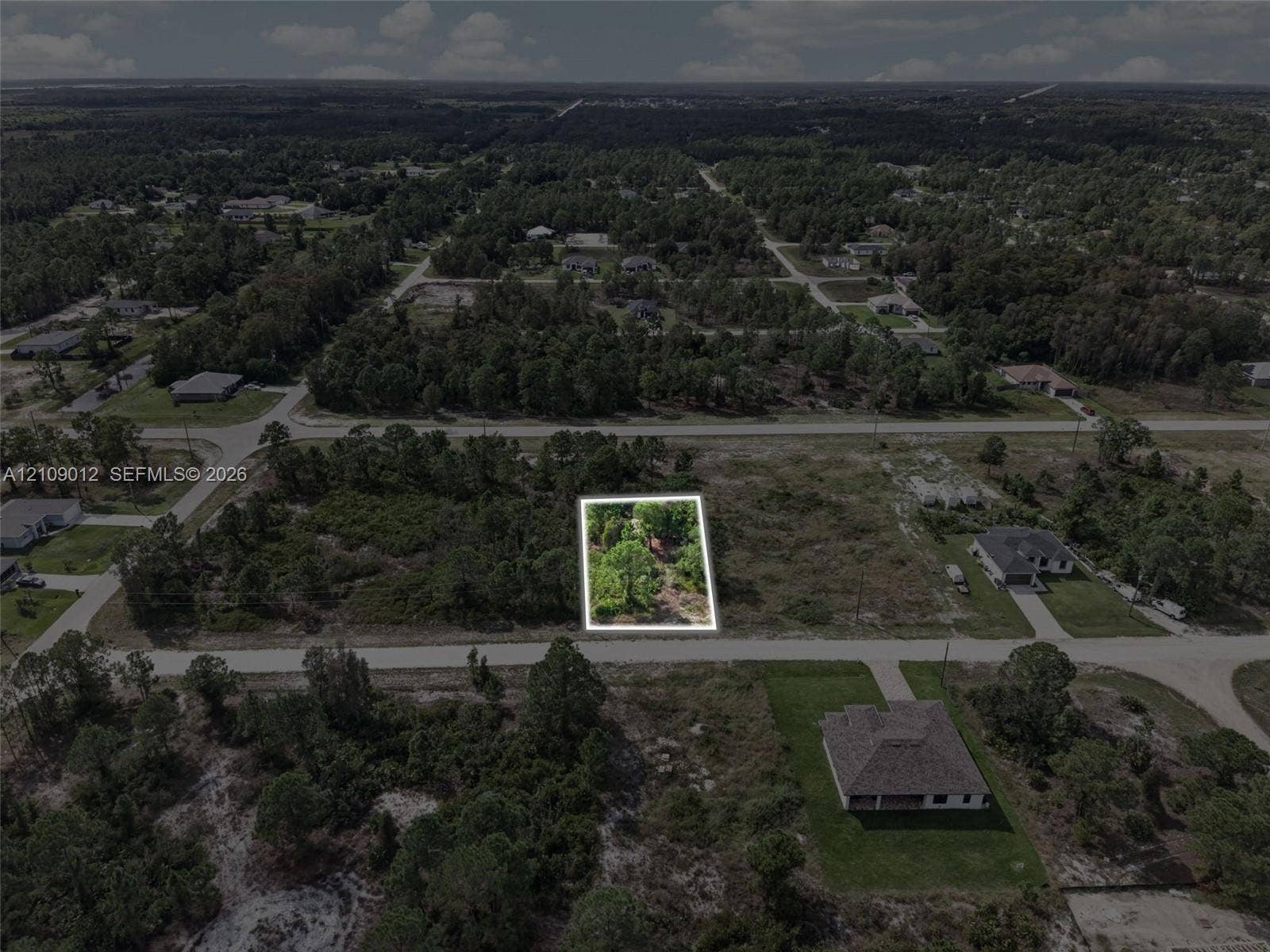 846 Burns Avenue S, Lehigh Acres, Lehigh Acres, FL 33974 Vacant parcel of land featuring native vegetation and direct road access