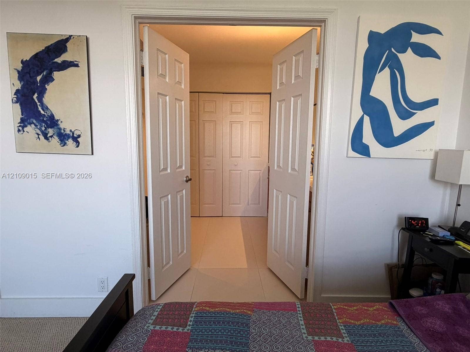 3530 Mystic Pointe Drive, #1709, Aventura, FL 33180 Double-door entry featuring paneled interior doors and a reach-in closet with folding doors
