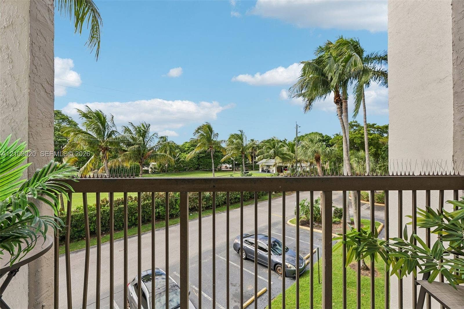 701 NW 19th Street, #300, Fort Lauderdale, FL 33311 Private balcony featuring vertical metal railing