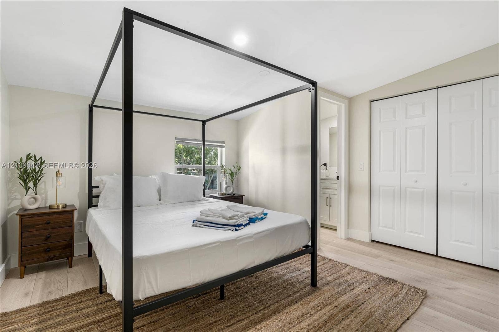 605 SW 17th Street, #1-3, Fort Lauderdale, Fort Lauderdale, FL 33315 Light-toned wood-finish flooring, dual-panel white closet doors, and recessed ceiling lighting