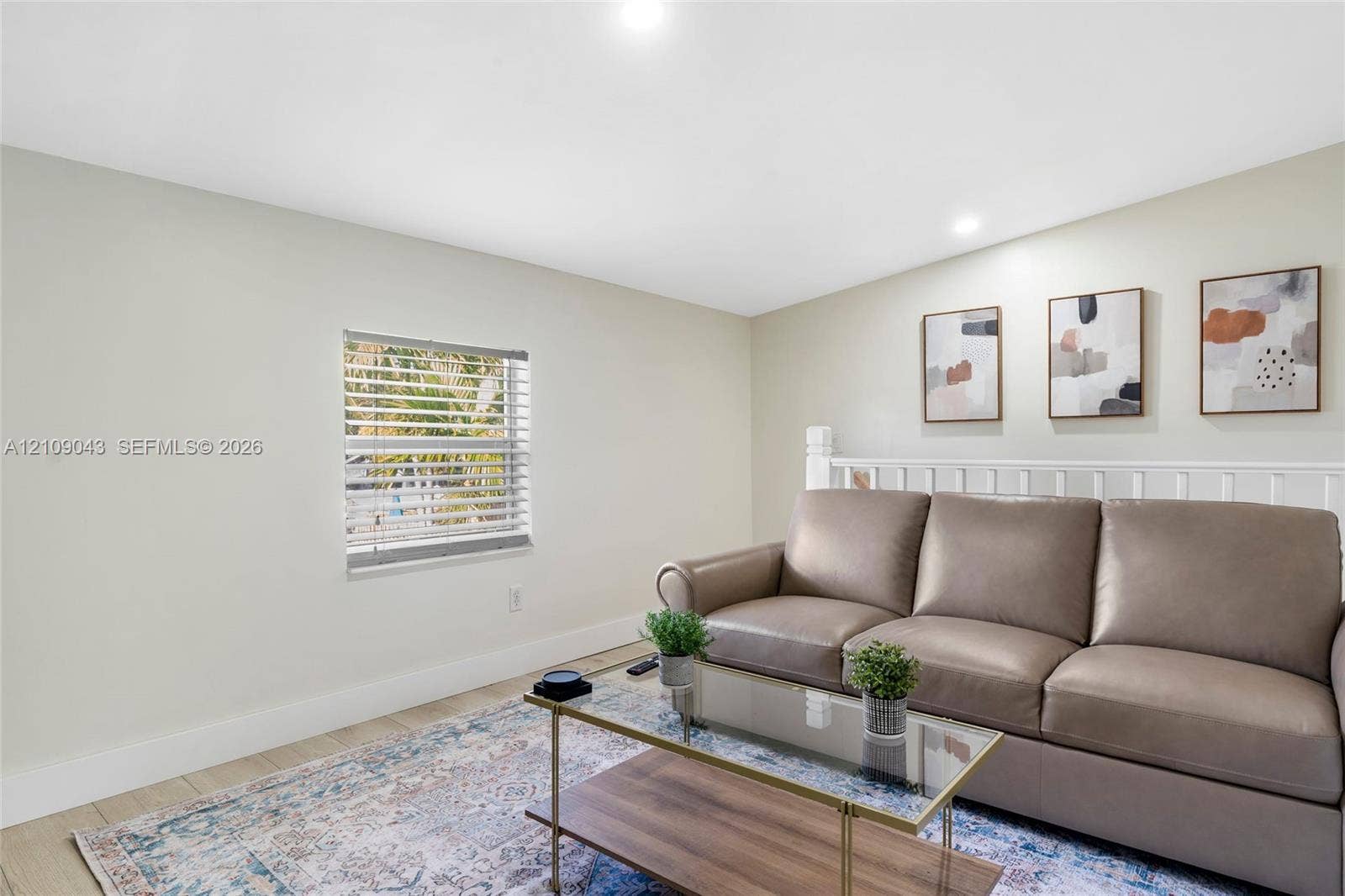605 SW 17th Street, #1-3, Fort Lauderdale, Fort Lauderdale, FL 33315 Neutral interior featuring wood-finish flooring, recessed lighting, and a white wooden stair railing