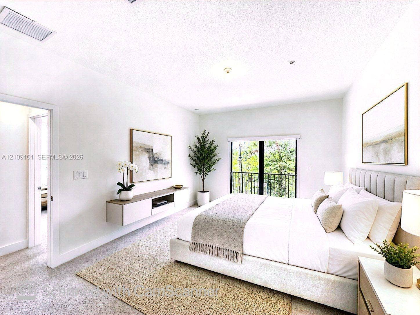 Floating wall-mounted media console, large-scale window with balcony access, and neutral carpeting